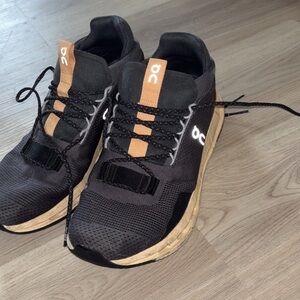On Running Black and Tan Athletic Shoes